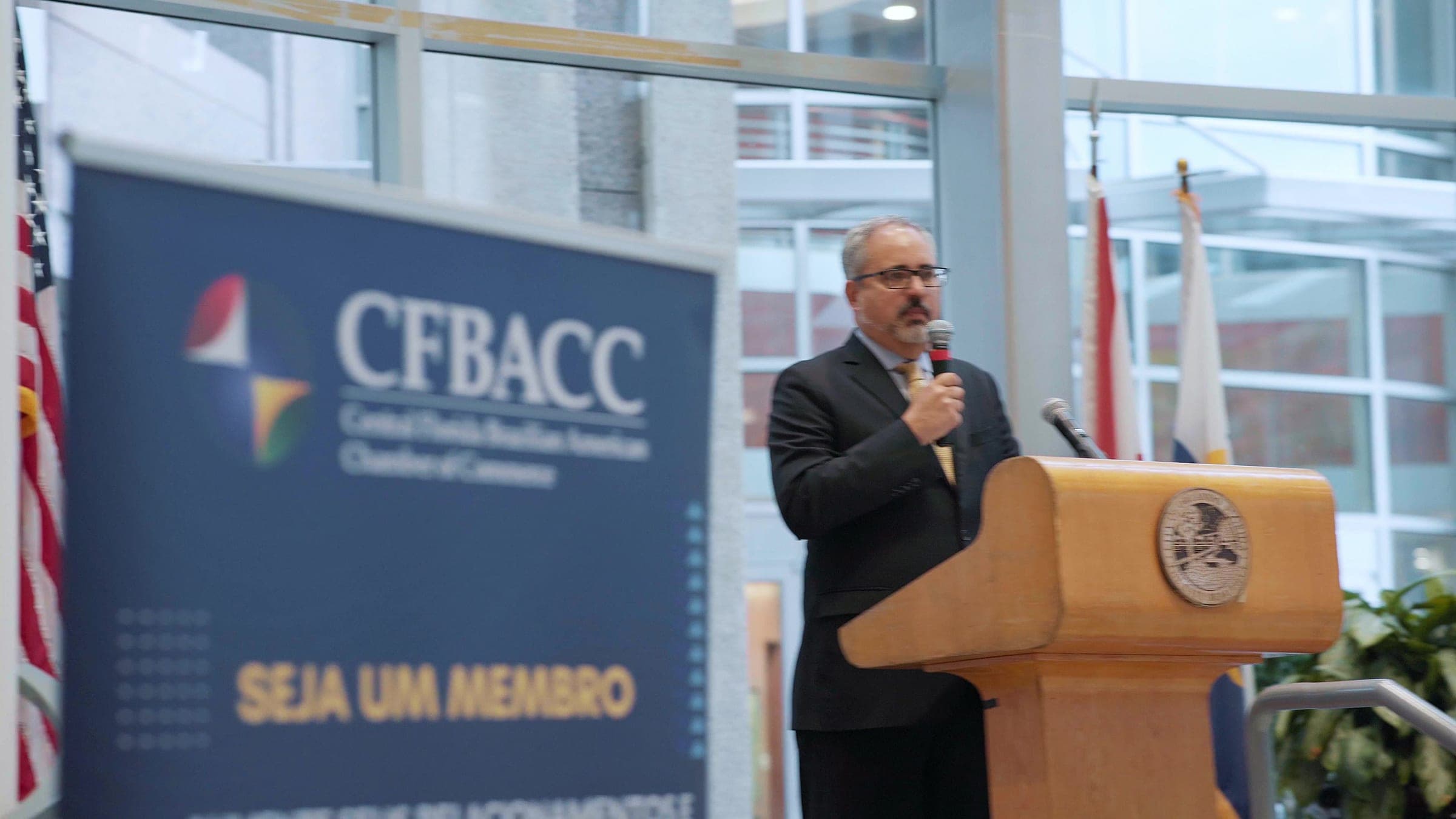 A speech at the podium during the Brazilian Independence Day ceremony at Orlando City Hall